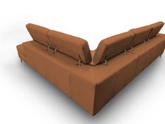 a couch that is made out of brown fabric and has four pillows on the back