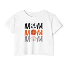 a mom's t - shirt with a basketball and ball on the front that says mom