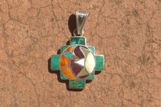 This powerful snake pendant is made by hand by the beautiful Quechua people of the Peruvian Andes. It is made by 950 silver mother of pearl, crystacola, spondyllus Weight : 5.5 gr width : 2.3 cm height (with hook) - 3.5 cm It is handmade in 950 silver by a local family of jewelry artisans. Spiritual Jewelry Pendant With Inlay, Small Snakes, Snake Pendant, Chakra Stones, Mother Of Pearl, Quartz Crystal, Belly Button Rings, Silver Pendant, Jewelry Crafts