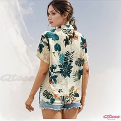 Whimsical Floral Shirt for Women with Adjustable Fastening and Button-Down Front Green Camp Collar Blouse For Summer, Casual Printed Blouse With Camp Collar, Summer Blouse With Buttons And Camp Collar, Green Short Sleeve Shirt With Buttons For Summer, Spring Hawaiian Button-up Tops, Hawaiian Summer Shirt With Buttons, Hawaiian Vacation Tops With Buttons, Hawaiian Style Tops With Button Closure For Spring, Spring Hawaiian Shirt With Buttons