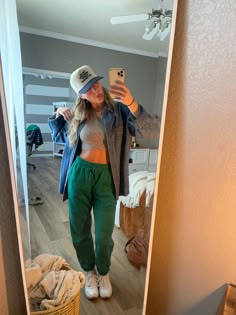 Green Nike Sweatpants Outfit, Sage Sweatpants Outfit, Green Sweatpants Outfit Winter, Green Sweatsuit Outfit, Dark Green Joggers Outfit, Light Green Sweatpants Outfit, Green Sweats Outfit, Colorful Sweatpants Outfit, Dark Green Sweatpants Outfit