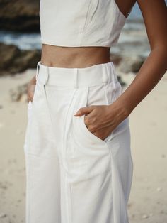 Designed to look and feel like a custom fit, the 100% Turkish cotton Pera Pants White have been crafted from comfy and breathable cotton. Boasting an unlined, wide-leg silhouette, binding on the front seams, the cotton Pera Pants are high-waist to flatter the figure and cut a dramatic shape. - 100% Turkish thick cotton - Hidden front closure - Side pockets - Zipper - Front seams with wide-leg cut silhouette - High-waist, elasticated back Pants White, Summer Style Casual, Style Office, Chic Woman, Sweatshirt Dress, Casual Elegance, Office Wear, Fashion Pants, Custom Fit