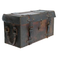 an old leather trunk with two handles and latches on the front, isolated against a white background