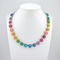 Rainbow Druzy The stunning Pastel Rainbow jewelry is the perfect way to add a touch of sparkle and shine to your look. Featuring a rainbow of colorful druzy elements, is one unique and eye-catching design. Product Details: Crystal Size: 12mm Crystal Color: Rainbow Druzy pattern Necklace Length: 21 crystals Bracelet Length: Adjustable from 6 to 8 inches.  Handmade in the USA with nickel free settings and the highest quality Austrian crystal elements. 12mm Crystal Jewelry handmade with the highest quality Austrian crystal elements. Necklace, Bracelet and earrings shown in and antique silver and Rhodium setting.  Perfect for Weddings, Dances, and Daily Wear. **JEWELRY CAN TYPICALLY BE MADE IN 1-2 DAYS AND SHIPPED ASAP IF NEEDED** Custom Options Available upon Request. Thank you for looking. Multicolor Sparkling Crystal Jewelry, Sparkling Multicolor Crystal Jewelry, Rainbow Crystal Jewelry With Rhinestones, Multicolor Rhinestone Crystal Necklace As Gift, Rainbow Crystal Jewelry Gift, Rainbow Crystal Jewelry For Gift, Rainbow Crystal Jewelry For Gifts, Adjustable Rainbow Necklace, Adjustable Round Rainbow Necklaces