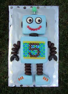 a birthday cake made to look like a robot