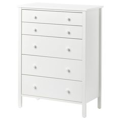 a white dresser with four drawers and two doors