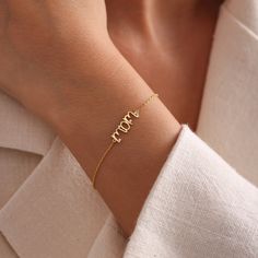 Your Minimalist Mama Bracelet is stylish, dainty and pretty ideal for everyday use. Details of solid gold handmade Dainty Gold Bracelet are very eye-catching. It is a great gift for your loved ones. This jewelry will be an indispensable piece of yours. This meaningful New Mom Gift with high quality handwork will be a legacy you can leave to your family its.  * Mom Script Bracelet Details * Material / Gold Kt:  14K (585), 18K (750), 8K (333) * Available Gold Colors: Yellow Gold, White Gold, Rose Minimalist Yellow Gold Bracelets For Mother's Day, Mother's Day Yellow Gold Name Bracelet, Elegant Rose Gold Bracelet For Mother's Day, Elegant Gold Plated Name Bracelet For Gift, Elegant Gold Plated Name Bracelet As Gift, Elegant Gold Plated Name Bracelet Gift, Modern Gold Name Bracelet For Gift, Modern Gold Name Bracelet As Gift, Minimalist Bracelet Jewelry For Mother's Day