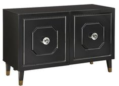 a black cabinet with two glass doors