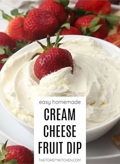 homemade cream cheese fruit dip in a white bowl with strawberries on the side and text overlay reading easy homemade cream cheese fruit dip