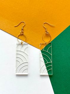 Calling all abstract lovers! Show your style with these acrylic laser-cut earrings! These earrings are the perfect accessories for your stylish outfit. -------------------------------------------------- * S I Z E S    &    M A T E R I A L S * - These earrings are roughly 8cm in length and 2cm in width. - This product is made of laser-cut acrylic plastic. It can come in a range of colours. Please refer to the colour options menu. - These earrings are available in gold shepherds hook fixtures. - E Modern White Geometric Earrings, Modern White Rectangular Earrings, White Laser Cut Earrings As A Gift, White Laser Cut Earrings For Gift, White Laser-cut Jewelry For Gifts, Modern Laser Cut Jewelry For Gifts, Acrylic Earrings Laser Cut, Laser Cut Jewelry Acrylic, Laser Cut Jewelry