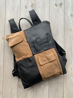 One of a kind upcycled leather backpack made from leather jacket using original pockets. Sustainable purse, perfect for gift.  Backpack is very light and comfortable to wear every day. Big enough for all necessities.  |WIDTH: 32 cm (12.6 in).  |HEIGTH: 42 cm (16.5 in).  You can choose recycled leather backpack plus leather purse. Pouch is perfect for your cosmetics, laptop charger or to use it as evening bag. It is made from the finest, soft, supple genuine upcycled leather. Accessorized with zi Daily Use Leather Backpack With Leather Patch, Leather Backpack With Patch For Daily Use, Leather Backpack With Leather Patch For Daily Use, Casual Everyday Leather Backpack With Leather Patch, Functional Leather Backpack With Multiple Pockets For Everyday Use, Casual Leather Bag With Leather Patch, Casual Brown Leather Backpack With Leather Patch, Black Urban Leather Backpack For Everyday Use, Urban Black Leather Backpack For Everyday Use