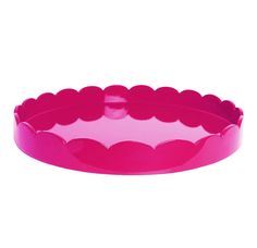 a pink plastic tray with scalloped edges