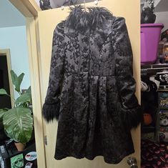 Absolutely Incredible Jacket. Cannot Believe I'm Parting With It But I Need A Larger Size My Loss Is Your Gain. Completely Sold Out And Rare To Find Specially In This Size! Perfect Condition, Was Never Worn!!! I Thought It Fit When I Purchased But Later Decided I Need To Size Up For How I Personally Like My Jackets. It's Technically True To Size And Would Fit A Xs Or S Wonderfully! Shiny Red Lining For A Beautiful Statement. Gorgeous Buttons And Fur Lining The Sleeves And Hood. Big Hood For Maxi Gothic Formal Winter Outerwear, Black Outerwear For Winter Costume Party, Black Outerwear For Costume Party In Winter, Spring Costume Outerwear With Long Sleeves, Long Sleeve Outerwear For Costume Party In Spring, Gothic Formal Outerwear For Fall, Formal Gothic Outerwear For Fall, Long Sleeve Fall Costume Outerwear, Long Sleeve Costume Outerwear For Fall