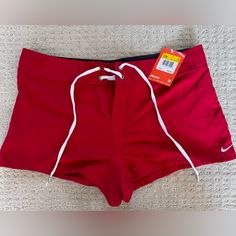 Red Nike Swim Shorts With Tie, Detail, And Guard On The Back Size Medium Nwt See Pictures For Details. Red Stretch Swim Trunks With Built-in Shorts, Red Swim Trunks With Built-in Shorts, Nike Swimwear With Built-in Shorts For Swimming, Red Fitted Swim Trunks For Summer, Fitted Red Swim Trunks For Summer, Red Summer Swim Trunks, Nike Casual Swimwear With Built-in Shorts, Nike Casual Swimwear In Short Length, Nike Casual Short Swimwear