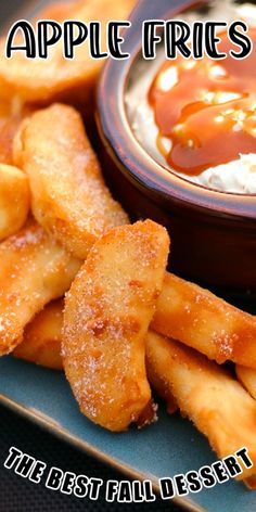 apple fries with caramel cream dip are on a blue plate next to a bowl of dipping sauce