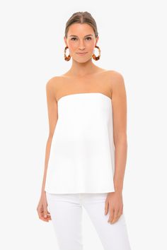 Effortlessly chic, the Strapless Crepe Marin Top evokes a timeless, but modern feel. Featuring a back zip and flowy strapless silhouette, this seasonless top makes getting dressed seamless. Pair with denim and statement jewelry for an elevated date night look.

Strapless
Supportive built-in bra
Back zip
Flowy silhouette
Outer: 100% Polyester
Lining: 97% Polyester, 3% Spandex
Care: Machine wash cold, hang to dry or dry clean Getting Dressed, Simply Chic, Chic Top, Fancy Pants, Party Tops, Night Looks, How To Look Classy, Perfect Party, Well Dressed