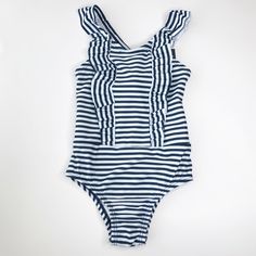 Beautiful Gap Baby Navy & White Swimsuit Gorgeous Ruffle Detail Two Sizes: 18-24 Months Toddler, 2 Yrs Toddler 18-24 Months 31-33 In 27-30 Lbs 2 Yrs Toddler 33-36 In 30-33 Lbs Shell: 82% Polyester, 18% Elastane/Spandex Lining: 100% Polyester U/V Protection 40+ Machine Washable White Summer One-piece With Ruffles, White Summer One Piece With Ruffles, White Ruffled One-piece For Summer, White Ruffled Summer One-piece, White Ruffled Summer One Piece, White Ruffled Swimwear For Play, White Ruffled One-piece Swimsuit, Casual White Ruffled Swimwear, Striped Ruffle Swimwear