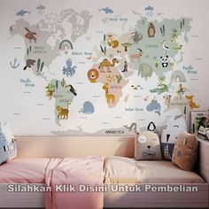 a child's bedroom with a map of the world painted on the wall and stuffed animals