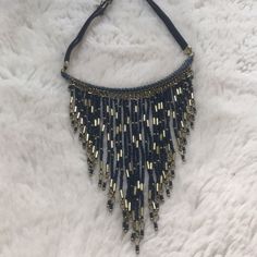 Free People Navy Fringe Necklace So Full Of Fringe, This Stunning Glass Beaded Necklace Is Featured In A Collar Style With Dangling Tassels And Metal Embellishments. Adjustable Fit Clasp Closure Bohemian Blue Beaded Necklace, Adjustable Bib Necklaces With Dangling Beads For Parties, Blue Beaded Choker For Party, Adjustable Bib Necklace With Dangling Beads For Party, Adjustable Blue Beaded Necklaces For Party, Blue Bohemian Necklaces For Party, Bohemian Blue Necklace With Black Beads, Party Bib Necklaces With Dangling Beads, Elegant Blue Choker For Festivals