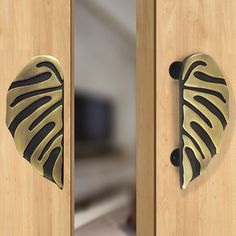 the door handle is shaped like a leaf