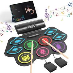 the electronic drum pad has musical notes and sticks in it, as well as an image of a cell phone