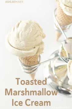 two ice cream cones on top of each other with the words toasted marshmallow ice cream