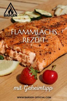 a piece of salmon sitting on top of a wooden cutting board