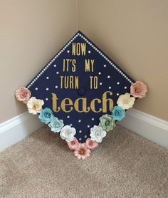 a graduation cap that says now it's my turn to teach