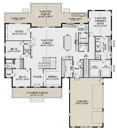 the first floor plan for a home with two master suites and an attached garage area