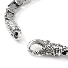 In 18th century Italy, no musician was as renowned as Niccolo Paganini. Created in carved sterling silver, Konstantino celebrates the virtuoso and creative passion of Paganini through this exceptional link bracelet. 8" long with lobster clasp to fit most wrists. Includes branded Konstantino gift packaging. Luxury Engraved Oval Link Bracelet, Luxury Chain Bracelet With Intricate Design, Formal Engraved Jewelry With Rectangular Links, Classic Engraved Oval Link Chain Bracelet, Luxury Engraved Oval Link Chain Bracelet, Elegant Engraved Oval Link Chain Bracelet, Elegant Engraved Oval Link Sterling Silver Bracelet, Elegant Engraved Sterling Silver Oval Link Bracelet, Classic Sterling Silver Bracelet Engraved For Formal Occasions