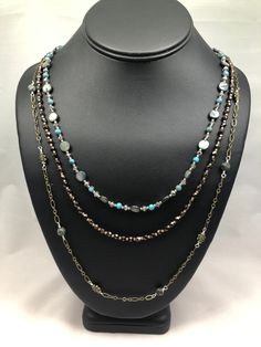 This beautiful handmade necklace features three beaded strands with a mix of Czech pressed glass beads and chain. All three strands are secured to an easy to connect lobster claw clasp with an antique bronze finish. A wonderful gift for the woman in your life, or that little something special to pick up on your self care day, this necklace is sure to dazzle and delight for any occasion, to truly make you The Belle of the Ball! Upper strand is 22''  Bottom strand is 26'' Self Care Day, Pressed Glass, Handmade Necklace, Bronze Finish, Something Special, Antique Bronze, Lobster Claw, Handmade Necklaces, Necklace Etsy