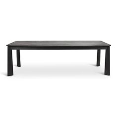 a black table sitting on top of a white floor