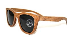 Driftwood - Zebra Wood with Grey Lenses $99 + two trees planted for every pair sold! www.driftwoodgear.com Pouch