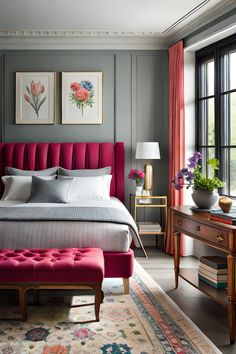 a bedroom with gray walls, pink headboard and red bench in front of the bed