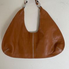 $230!! Banana Republic Brown Leather Shoulder Bag Is New Without Tags! In Brand New Unmarried Condition. Half Moon Shaped With White Stitching And Silver Hardware. Snap Closure With Brown Canvas And Leather Lining; Banana Republic Leather Tag And Zippered Pocket Inside. 16 Inches Wide And 14.5 Inches From Top Of Strap To Bottom Of Purse. Very Elegant Bag. Retailed For $230. Chic Hobo Tote Bag With Silver-tone Hardware, Chic Hobo Bag With Silver-tone Hardware, Chic Hobo Bag With Silver-tone Hardware For Shopping, Hobo Bag With Silver-tone Hardware For Errands, Brown Hobo Bag With Silver-tone Hardware For Daily Use, Casual Leather Shoulder Bag With Silver-tone Hardware, Chic Tan Textured Leather Shoulder Bag, Formal Brown Hobo Bag With Silver-tone Hardware, Brown Hobo Bag With Silver-tone Hardware For Shopping