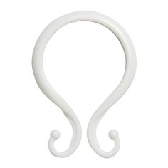 a pair of white plastic hooks on a white background