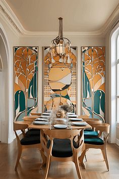 the dining room table is set with place settings for six people, and has an art deco screen behind it