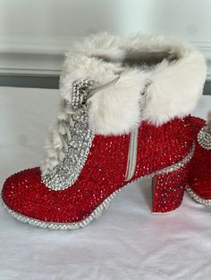 This heeled combat bootie with Faux Fur detail and fully rhinestoned can be designed with or without a logo. Get your rhinestoned boots and show your style. These can be for parties, games, special occasions. Winter Rhinestone Boots With Round Toe, Winter Boots With Rhinestones And Round Toe, Glamorous Winter Platform Boots, Glamorous Winter Boots With Rhinestones, Glamorous Rhinestone Winter Boots, Party Boots With Bling And Round Toe, Party Heeled Boots With Rhinestones And Round Toe, Party Boots With Bling, Bedazzled Party Boots For Winter