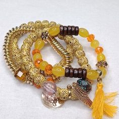 New Stretchable From Pet Free & Smoke Free Home. Ask Me Anything About This Item :-) Serious Inquiry Only. Bundle & Pay Shipping Only Once. Ships Same Or Next Business Day. Casual Yellow Beads For Beach, Adjustable Yellow Bracelet With Wooden Beads, Trendy Handmade Yellow Beads, Yellow Bohemian Bracelets With Gold Beads, Adjustable Yellow Wooden Beaded Bracelets, Yellow Wooden Bead Bracelets, Yellow Spiritual Beaded Bracelets For Festivals, Yellow Bracelet With Round Wooden Beads, Yellow Wooden Beads Bracelet