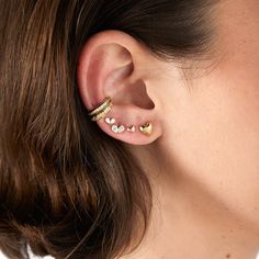 Description: * NO PIERCING NEEDED *14K gold & 0.16 ct diamonds. *This edgy ear cuff adds a twist to everything. Its shiny spark is an eye-catcher. It is sexy and cute. Fits the office or to a full day of hanging at the beach without even noticing you are wearing it. Yellow Gold Ear Climbers Fine Jewelry, Yellow Gold Fine Jewelry Ear Climbers, 14k Yellow Gold Ear Climbers With Diamond Accents, Yellow Gold Diamond Ear Climbers For Gift, Gold Cubic Zirconia Ear Climbers Fine Jewelry, Yellow Gold Cubic Zirconia Ear Climbers With Prong Setting, Yellow Gold 14k Diamond Accented Ear Climbers, Yellow Gold Ear Climbers With Diamond Accents For Anniversary, Single Yellow Gold Cubic Zirconia Ear Climber