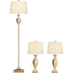 a set of three lamps sitting next to each other on a white background with one lamp turned off