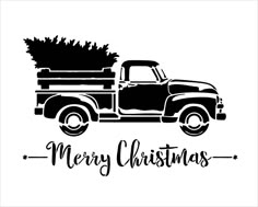 an old truck with a christmas tree in the back and merry lettering on the side