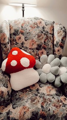 a mushroom pillow sitting on top of a chair