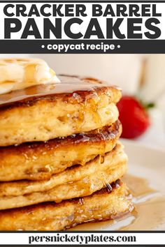 a stack of pancakes with icing and syrup on top