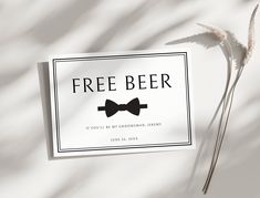 a paper sign with a bow tie on it