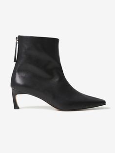 Editor's NotesNeute's collection is artful and elegant. Easy and harmonious to your everyday style.- Wide opening ankle boots- Modern square toe- Kitten heel- Back zipper closure- Luxurious soft leather texture- Comfortable fitMeasurements(in.)- Size: KR225mm(US 5.5)-KR260mm(US 9)- Heel height: 2.4 in.- Fits to true sizeComposition & Care- Upper: Lambskin- Lining: Pig Skin- Do not wash- Professional shoe cleaning recommendedDesigner- by Neute Square Toe Ankle Boots, Shoe Cleaning, Professional Shoes, Modern Square, Clean Shoes, Leather Texture, Pig Skin, Kitten Heel, Black Ankle Boots