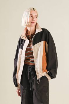 A woven color block windbreaker Details: Self: 100% NylonContrast 1: 100% NylonContrast 2: 100% Nylon Size & Fit - Model is 5`8" And Wearing Size Small- Measurements Taken From Size Small- Approx. Length: 24" Black Nylon Windbreaker For Fall, Cheap Retro Windbreaker For Sports, Spring Brown Windbreaker For Streetwear, Trendy Black Nylon Windbreaker, Casual Nylon Outerwear With Contrast Color, Trendy Nylon Windbreaker For Fall, Khaki Nylon Track Jacket For Fall, Fall Nylon Outerwear With Contrast Color, Retro Color Block Outerwear For Fall