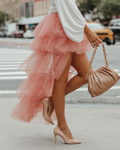 True to Size Self & Contrastâ€?100% Polyester and Liningâ€?97% Polyester and 3% Spandex Hand Wash Cold.Dry Flat Elastic Waistband High Low Hemline Tiered Tulle Fabrication No Closures Lined Channel your inner Carrie Bradshaw in our Liza High Low Tiered Tulle Maxi Skirt! This blush colored skirt is crafted with an elastic waistband and a high low hemline. Contrast this femme piece with a graphic tee! Styled with the Perfect Hoop Earrings. 5 Disc Choker. Chloe Mini Necklace. Compass Coin Necklace. Simple Bangle Bracelet. Chic Crossbody Chain Pouch Bag. Vittoria Tie Front Crop Blouse. and Lavish Patent Leather Pumps.---SIZE AND FIT---Model is Wearing a Size Small. Height is 5'9". Bust is 32â€? Waist 24.5â€? and Hips 34â€?/span> Size XS: Length measures 13 â€?from shoulder to front hem and 41â Skirt With Cowboy Boots, Off Shoulder Evening Gown, Tiered Tulle Skirt, Tulle Maxi Skirt, Tulle Skirts, Mini Necklace, Mini Skater Dress, Carrie Bradshaw, Crop Blouse