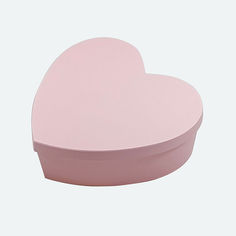 a pink heart shaped box on a white background