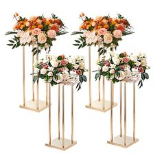 three gold vases with flowers and greenery on them are shown against a white background